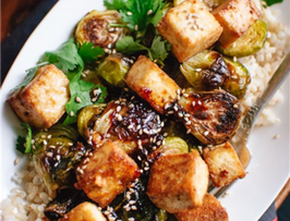 Sesame Glazed Crispy Tofu and Brussels Sprouts & Delicata Squash Quinoa Bowl