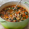 Vegetable soup with ditalini pasta, cannellini beans, pesto, and squash