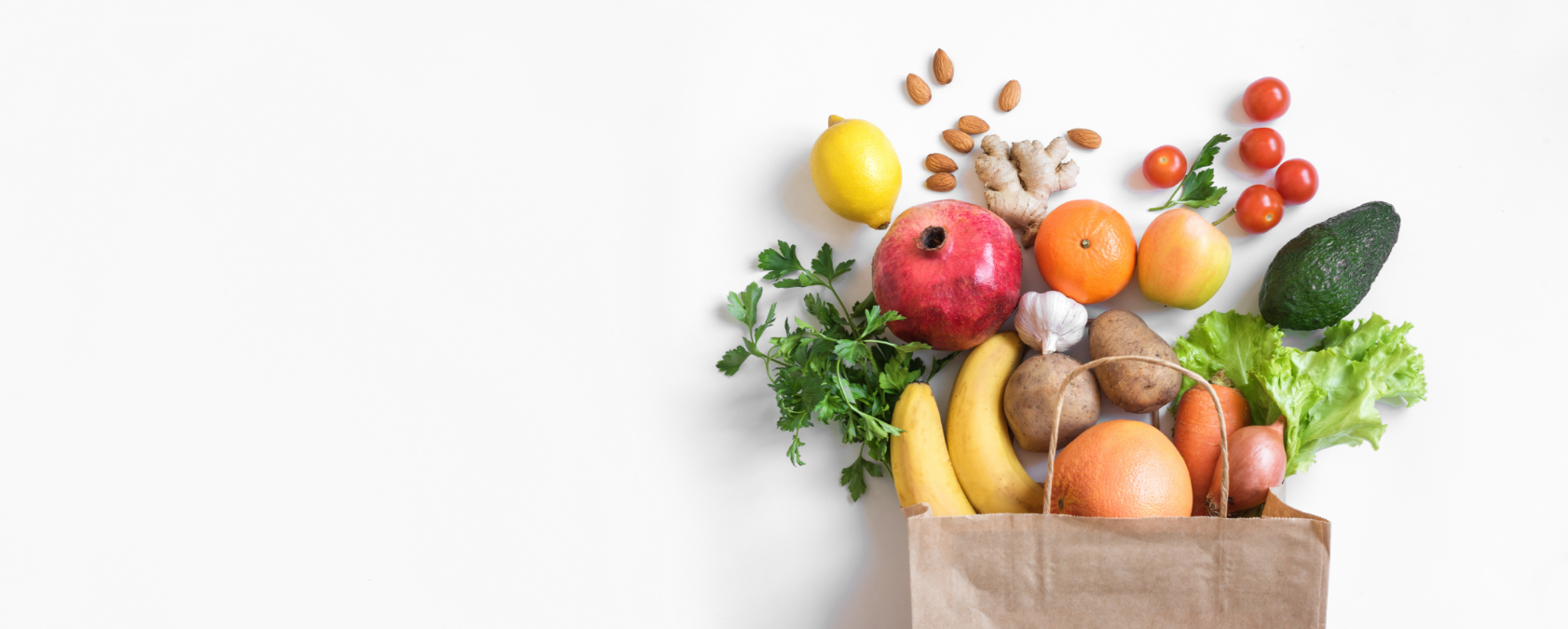 A paper bag overflows with fresh produce
conveying health and abundance